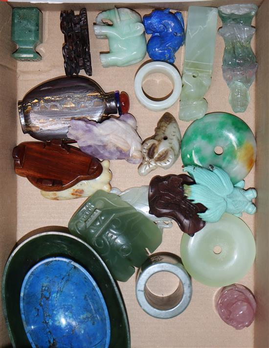 A group of Chinese stone carvings, a spinach green jade dish and a lapis lazuli dish